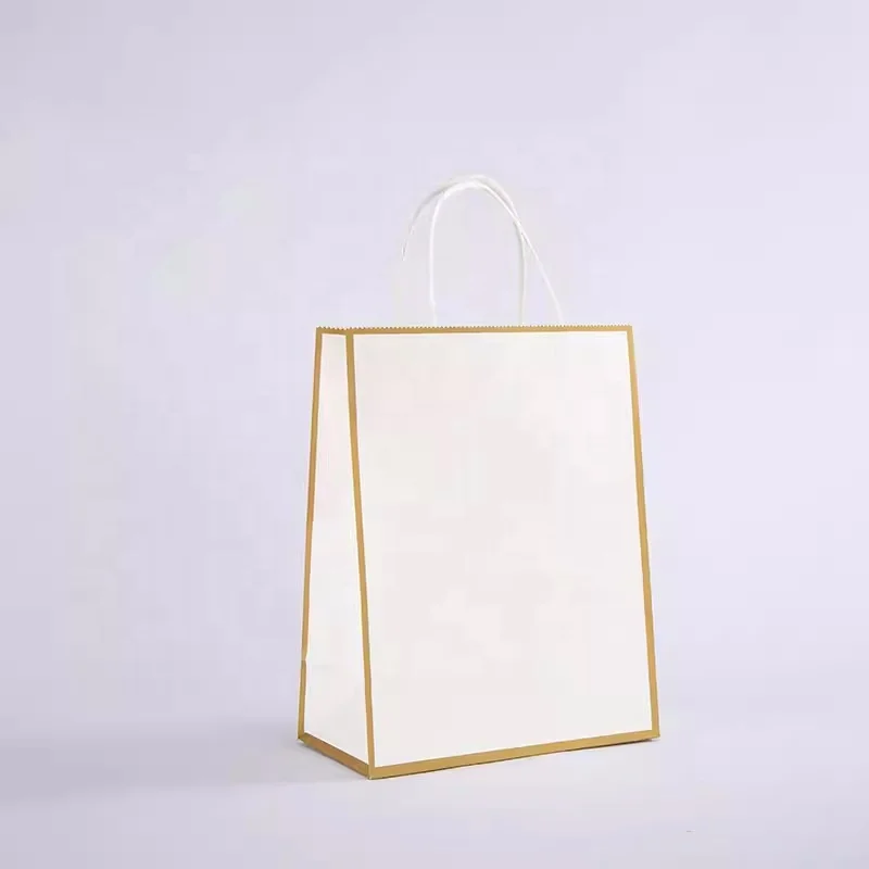 Custom..pieces.Whosale clothing paper bag customised logo/name paper bag paper bag with handle rope