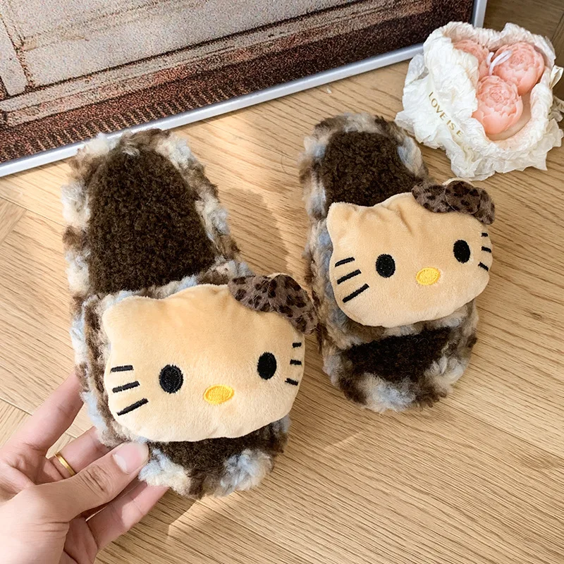 شباشب للأطفال أحذية منزلية كارتونية هالو كيتي أحذية شتوية مفتوحة من الأمام للفتيات أحذية دافئة مضادة للانزلاق باللون البني والأزرق مقاس 26-37