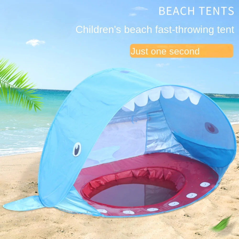 

Full-automatic quick-opening children's beach tent is simple and portable, and cute sharks and children play sand