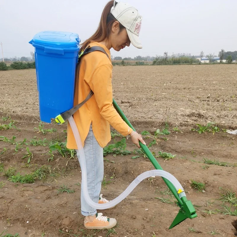 آلة الأسمدة الزراعية السفلية أدوات العمل الزراعية مجرفة الأسمدة اليدوية اختيار الملابس العلوية الأوتوماتيكية الصغيرة
