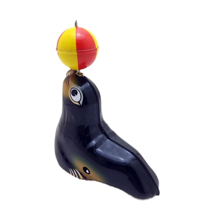 MS665 Giocoleria animale con palla di leone marino, collezione di artigianato retrò, oggetti di scena per negozi di abbigliamento, giocattoli di latta