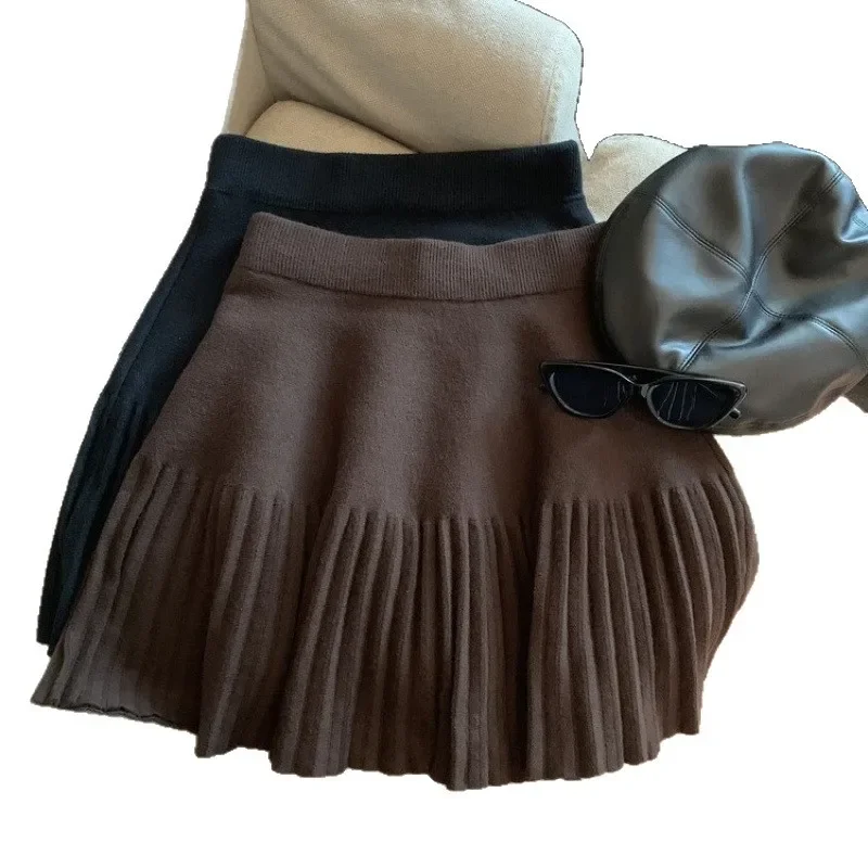 ربيع الخريف محبوك المشمش تنورة قصيرة ألف خط نصف طول المرأة المألوف مطوي تنورة صغيرة تصميم بسيط لباس غير رسمي