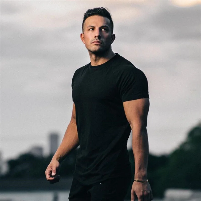 Solidna bawełniany T-Shirt z krótkim rękawem męska odzież sportowa modna koszulka sportowa do kulturystyki Fitness
