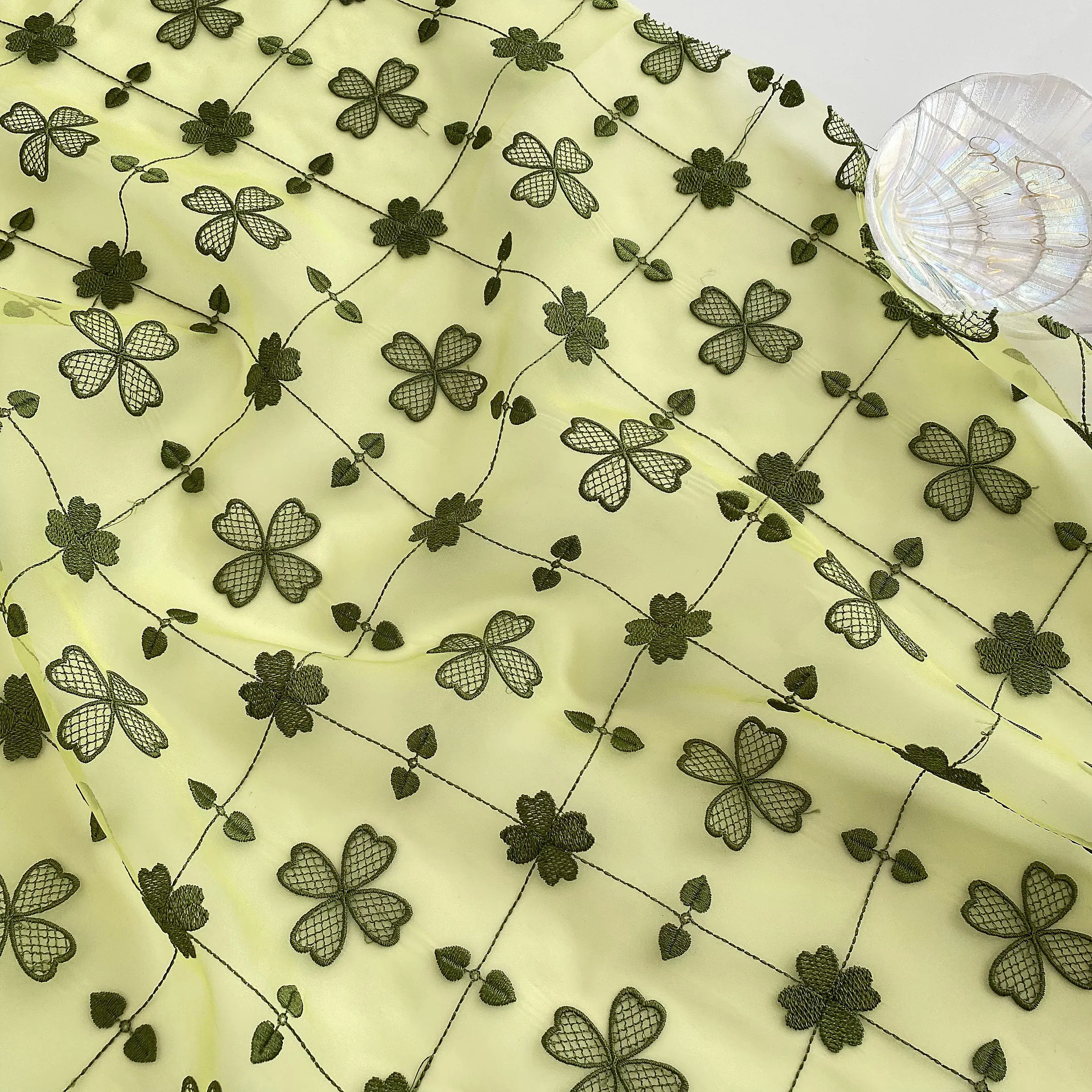 

High quality green tea colored organza fabric material for clothes Flower embroidery fabric Women's clothing skirt DIY sewing