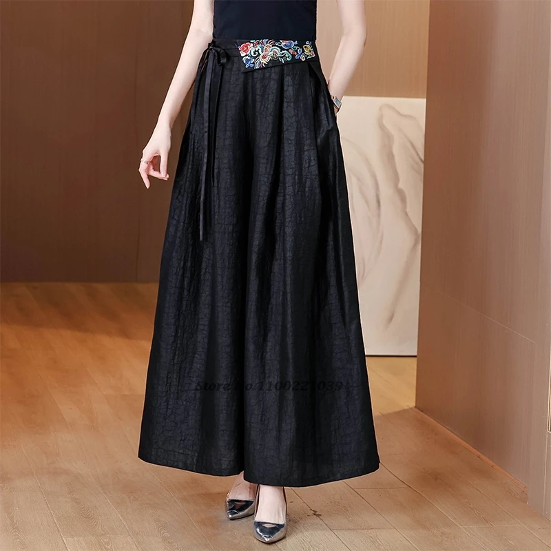 2025 السراويل الصينية خمر الرجعية الساتان السراويل الشعبية الوطنية زهرة التطريز السراويل العرقية مرونة الخصر واسعة الساق السراويل