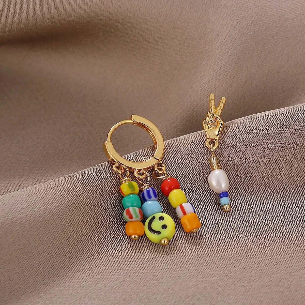 Ouyang Nana New 2022 String Beaded Smiley Face Colorful Earrings Niche Non-Symmetric Cute Ear Clips Fashionable Jewelry