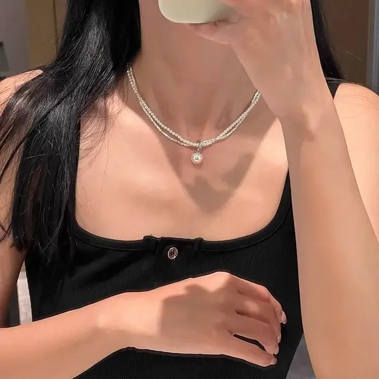 

2024 New Universal Buckle S925 Small Pieces of Silver Pearl Double Layer Light Luxury Minority Design Clavicle Chain Female