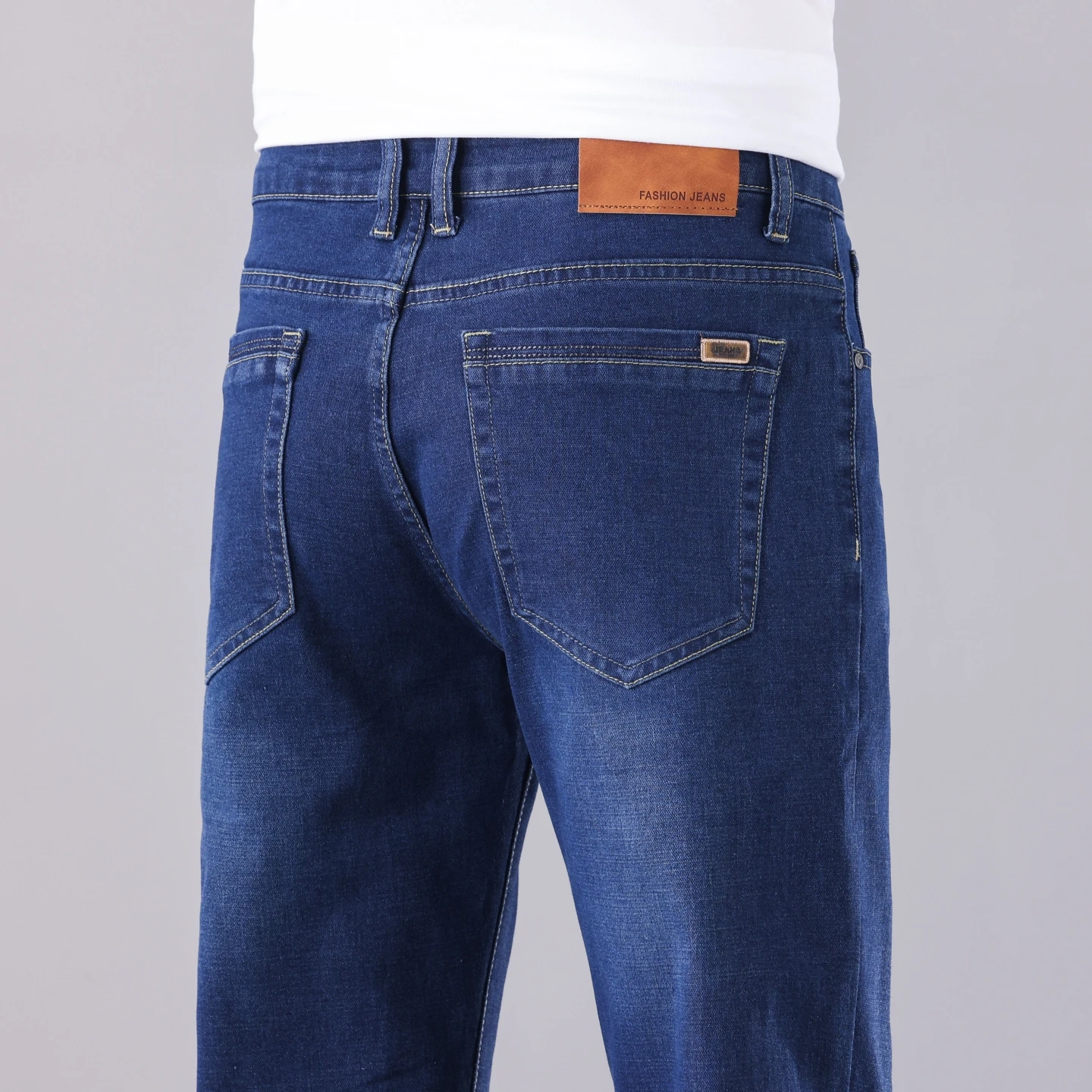 28-46 Plus Size Men's Straight Midwweight Jeans 2026 Spring Autumn Classic Badge Stretch Denim Business Casual Jeans Trousers