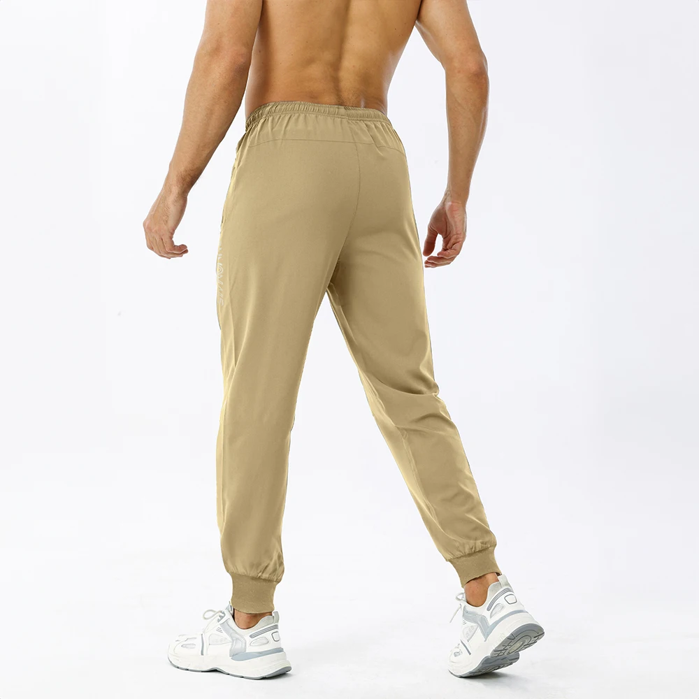 Pantalones de chándal con cremallera y bolsillo para hombre, ropa ajustada para entrenamiento de fútbol y trotar, a la moda, novedad