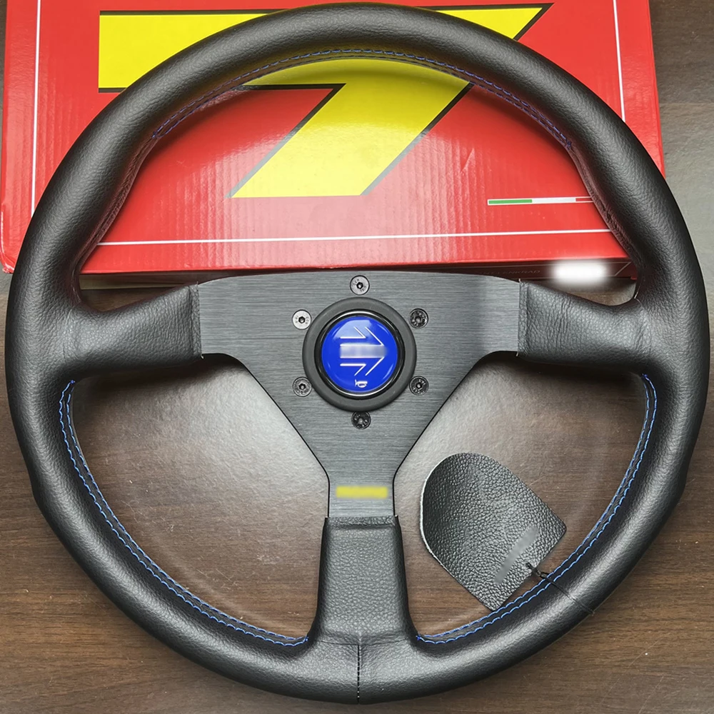 

MOMO Monte Carlo 350MM Steering Wheel Black Leather / Blue Stitching New