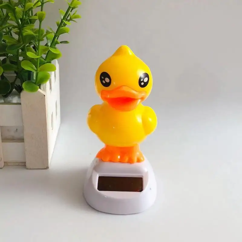 Pato amarelo painel do carro decoração solar pato amarelo adorável estatuetas animais brinquedo traço boneca para paisagem acessórios jardim