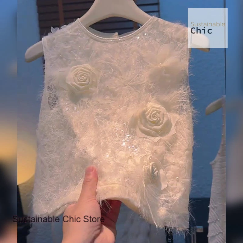 

Summer new fashion round neck stitching embroidery big flower vest shirt blouse high-grade feeling beautiful temperament shirt.