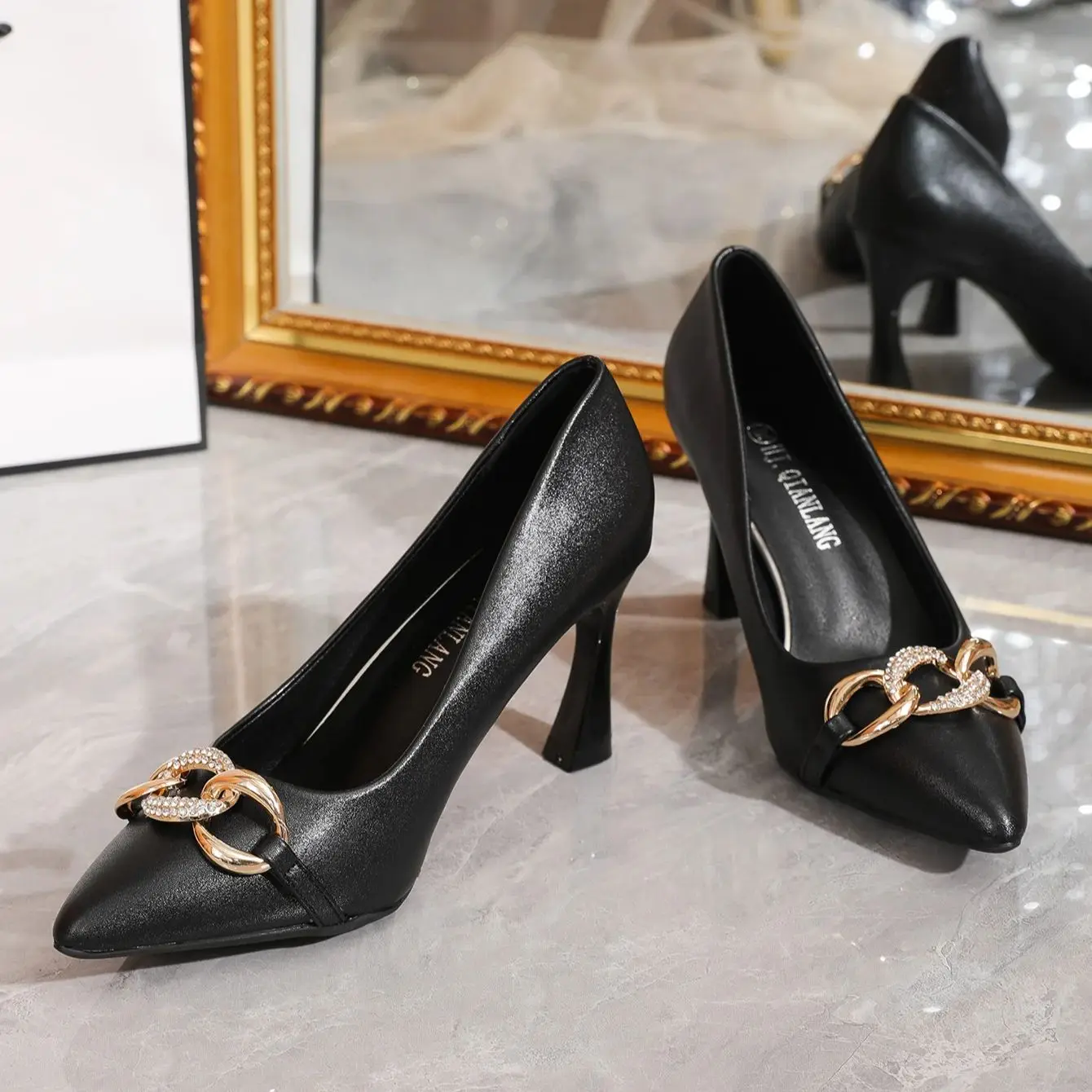 Fashion high-heeled and shallow-mouthed fashion single shoes with pointy buckle