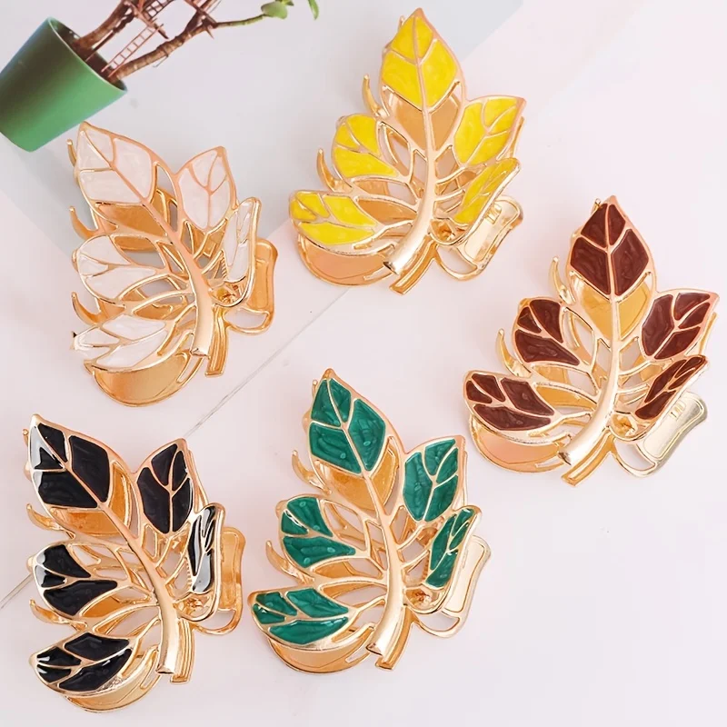 Hot-selling hair accessories women colored metal leaves grab the back of the head ball head clip all the ponytail hair claw