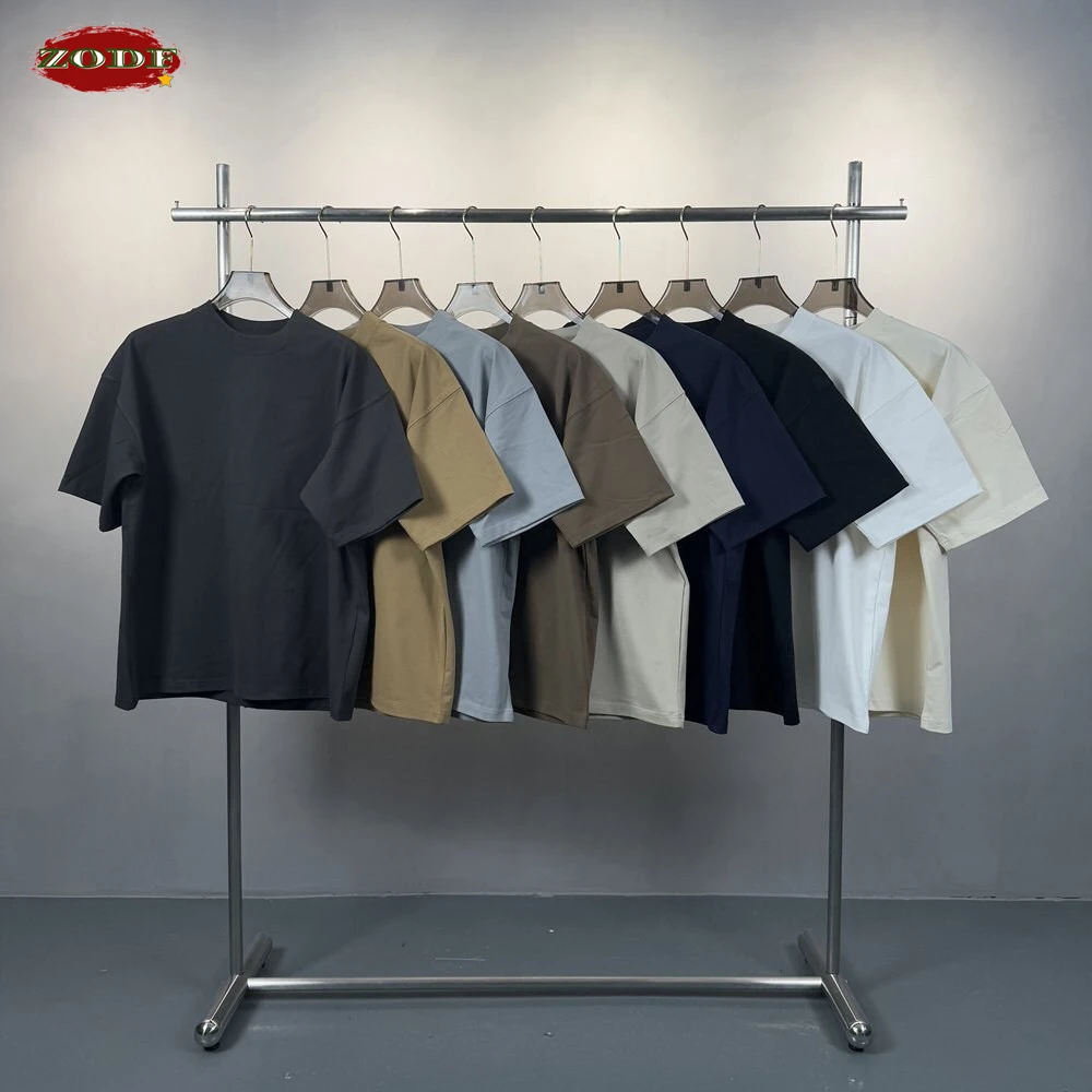 

ZODF Мода 2026 Летняя мужская футболка 350 г/м2 унисекс с высоким воротом Oversize с коротким рукавом Тяжелая хлопковая футболка Брендовые футболки HY0031
