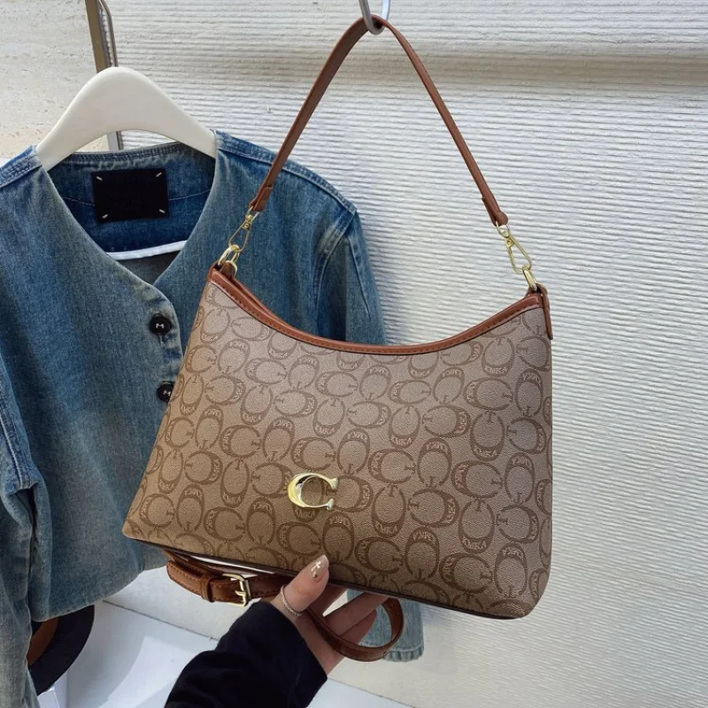 

Простая-элегантная новинка 2025 года, женская роскошная брендовая кожаная сумка на плечо, известный дизайнер, популярная, простая, повседневная ​