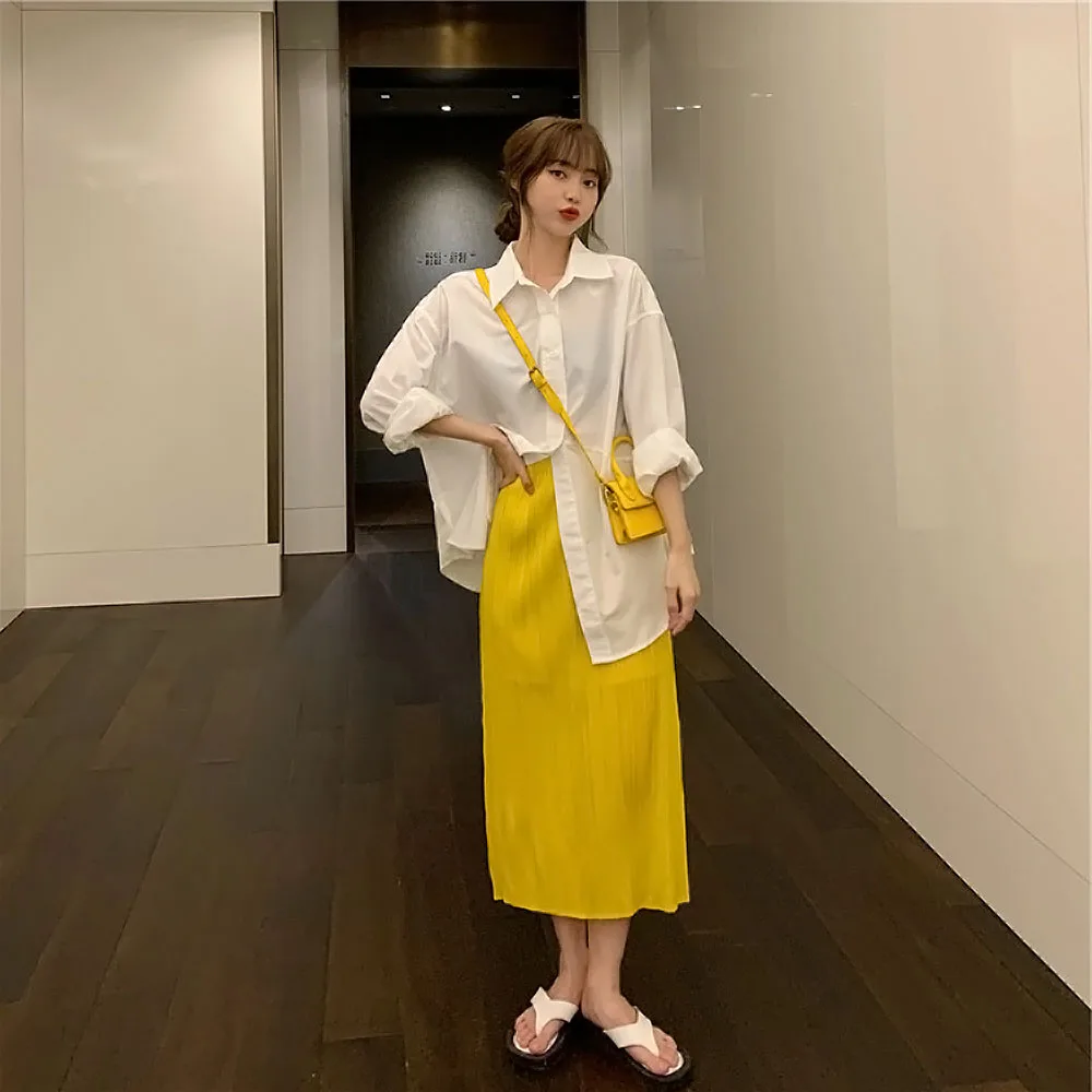 

Весенне-летняя женская юбка миди с высокой талией, А-силуэт, плиссированная, однотонная, с асимметричным разрезом, в японском стиле, длиной до колена