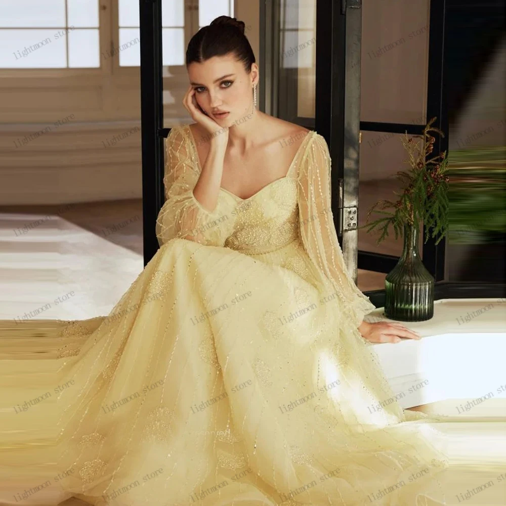 ชุดราตรีหรูหรา ชุดงานพรอมสวยงาม ประดับด้วยลูกปัดและงานปักแขนยาวทรงเอไลน์ ชุดราตรีทรงสวยสง่า สามารถสั่งตัดได้ ปี 2026