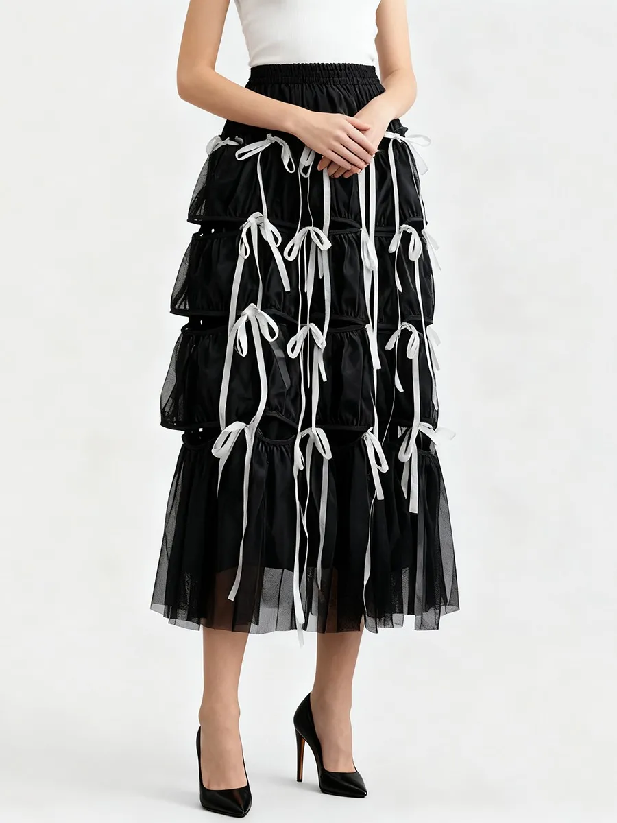 TWOTWINSTYLE Loose Spliced Bowknot Fashion Skirts for Women High Waist Patchwork Shirring Long Skirt Female Autumn Clothing New