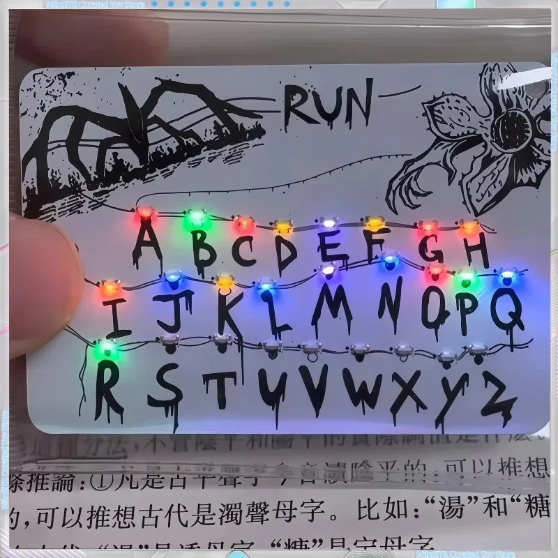 Stranger Things Season 5 Merch Light Pendant - 26 Letters3 Music4 Lights,Rechargeable - Car Pendant Festival Gift with Light Bag