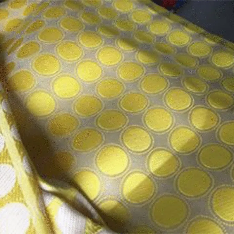 Yellow-colored jacquard fabric geometric woven women's trousers with polka dot