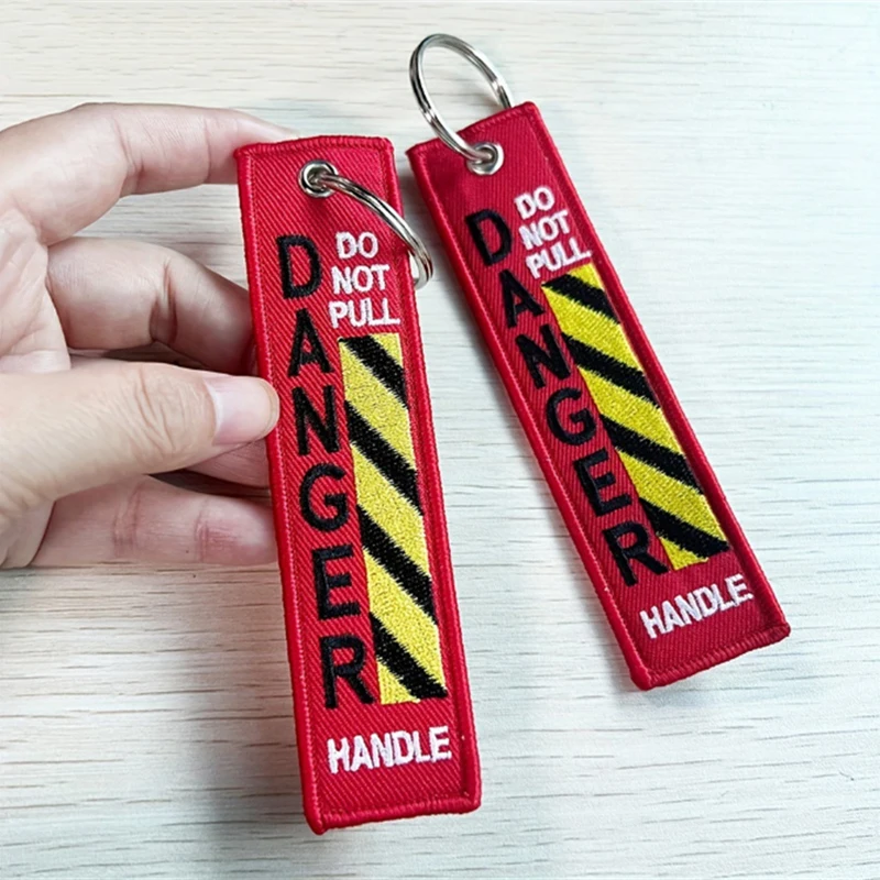 

1PC Double Sided Embroidered Keychain Do Not Pull Danger Warning Line Red Label Motorcycle Air Keychain Bags Accessories