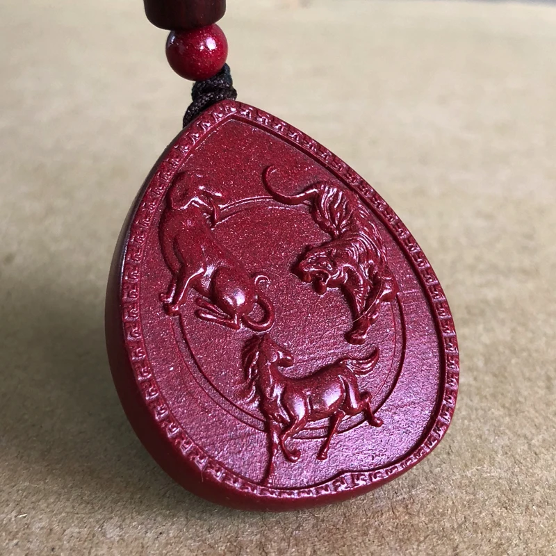 The cinnabar zodiac pendant belongs to the noble Zijin Sand Yinwu Gift Certificate of Tiger, Horse and Dog.