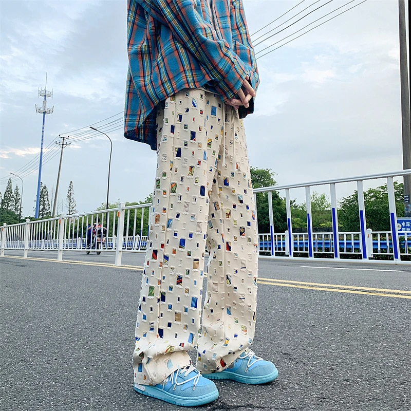 Celana Panjang Gaya K-POP Musim Semi Musim Gugur Celana Kargo Pinggang Elastis Kasual Longgar Pria Kasual Baru Celana Cetak Jacquard Retro