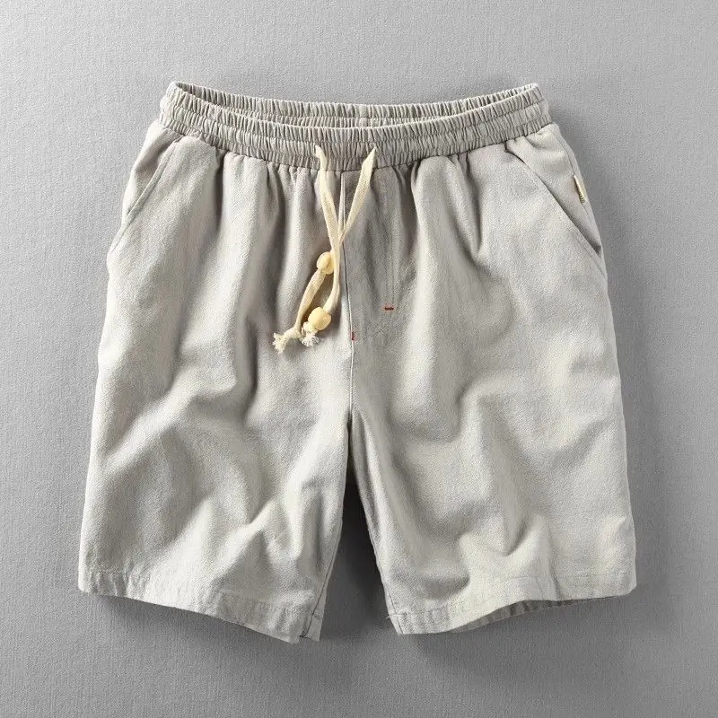 Moda semplicità uomo estate strada Casual lino elastico in vita tinta unita stile sottile tirando corda traspirante pantaloncini di grandi dimensioni