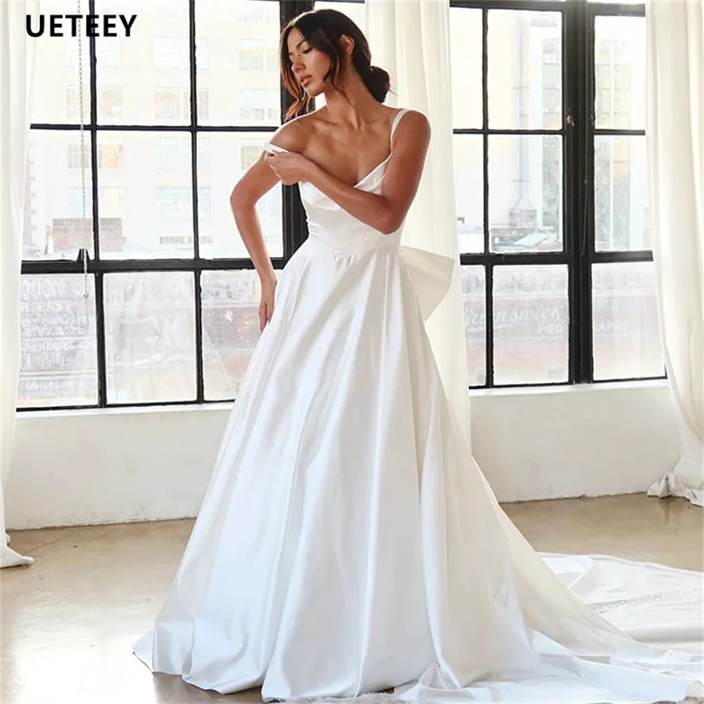 

UETEEY Customized Detachable Bow Spaghetti Straps Satin Wedding Dress For Women A Line Illusion Back Court Train Bridal Gown