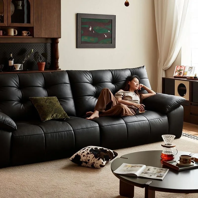 Light luxury Italian big black bear cloud leather sofa, new modern cowhide straight row sofa in the living room