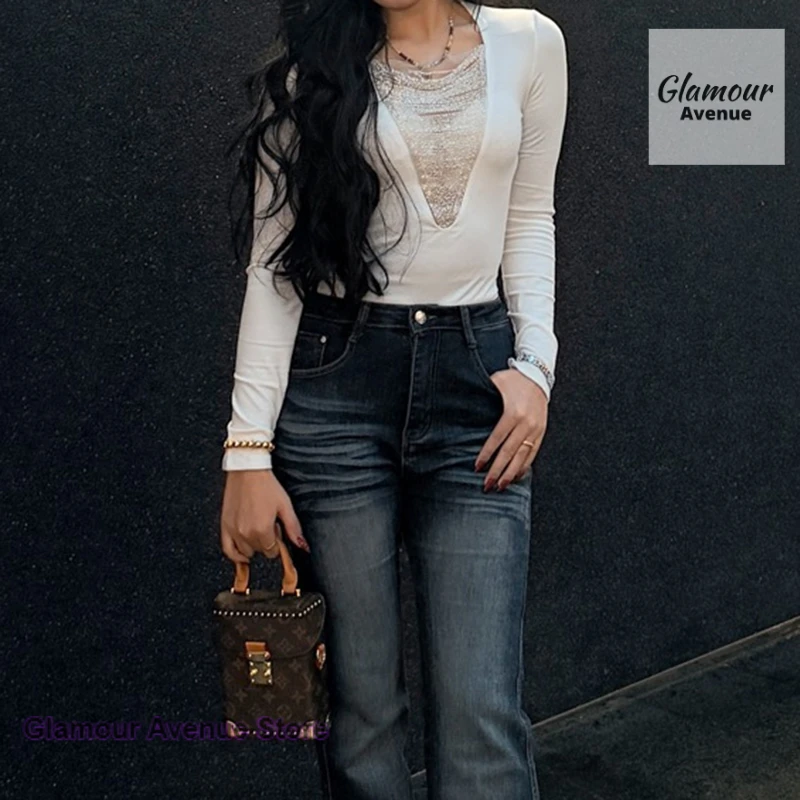 Korean design sense bead chain splicing long-sleeved T-shirt female spring and autumn waist with hot girl tight bottoming top.