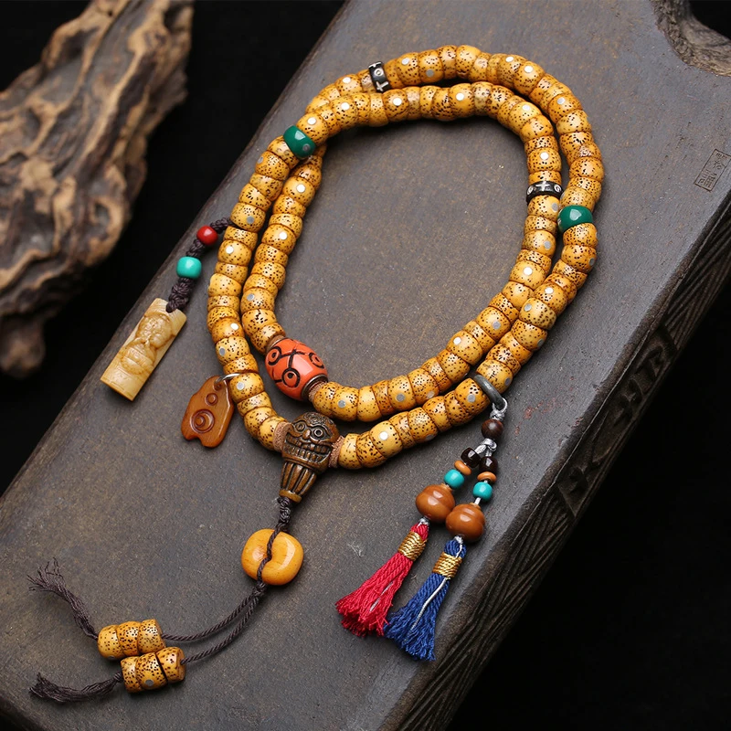 108 of-Moon Bodhi beads, cut pieces from old stock, with a bone peace and clasp accessories