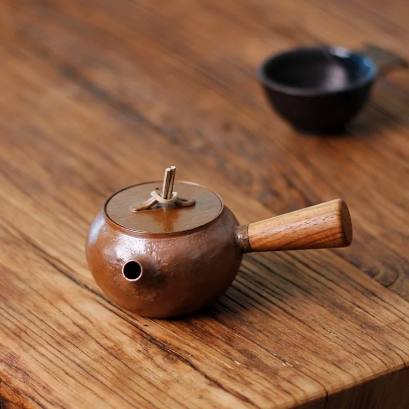 

Side handle small copper pot retro kung fu tea set tea pot, pure handmade purple copper pot, one tea set tea utensil