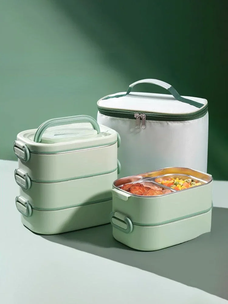 

Office workers can use microwave to heat multi-layer lunch boxes with rice bowls for primary school students.