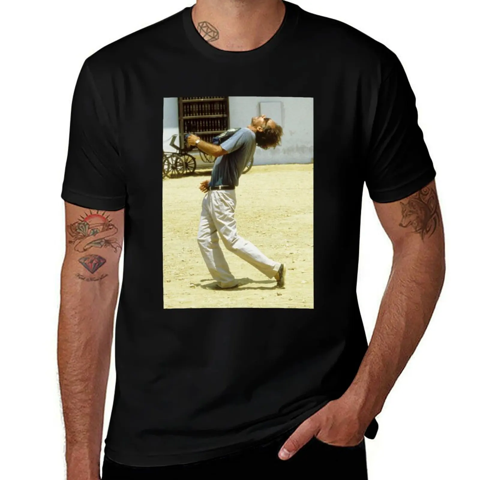

Werner Herzog pose from Cobra Verde T-Shirt vintage anime shirt vintage clothes mens white t shirts