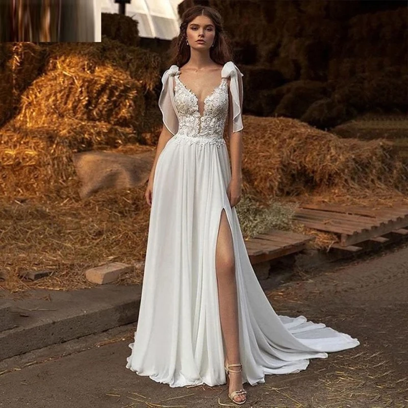 

Boho Chiffon Wedding Dresses Side Slit Sexy Backless A-Line White Long Bridal Gowns Deep V-Neck Lace Appliques Straps Sleeveless