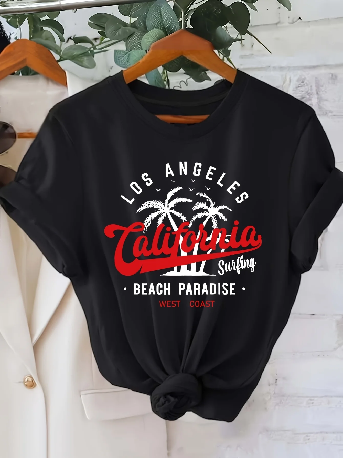 

Women's Los Angeles California Beach Surfing Paradise Graphic T-Shirt - Black Crew Neck Short Sleeve Top with Palm Tree Design