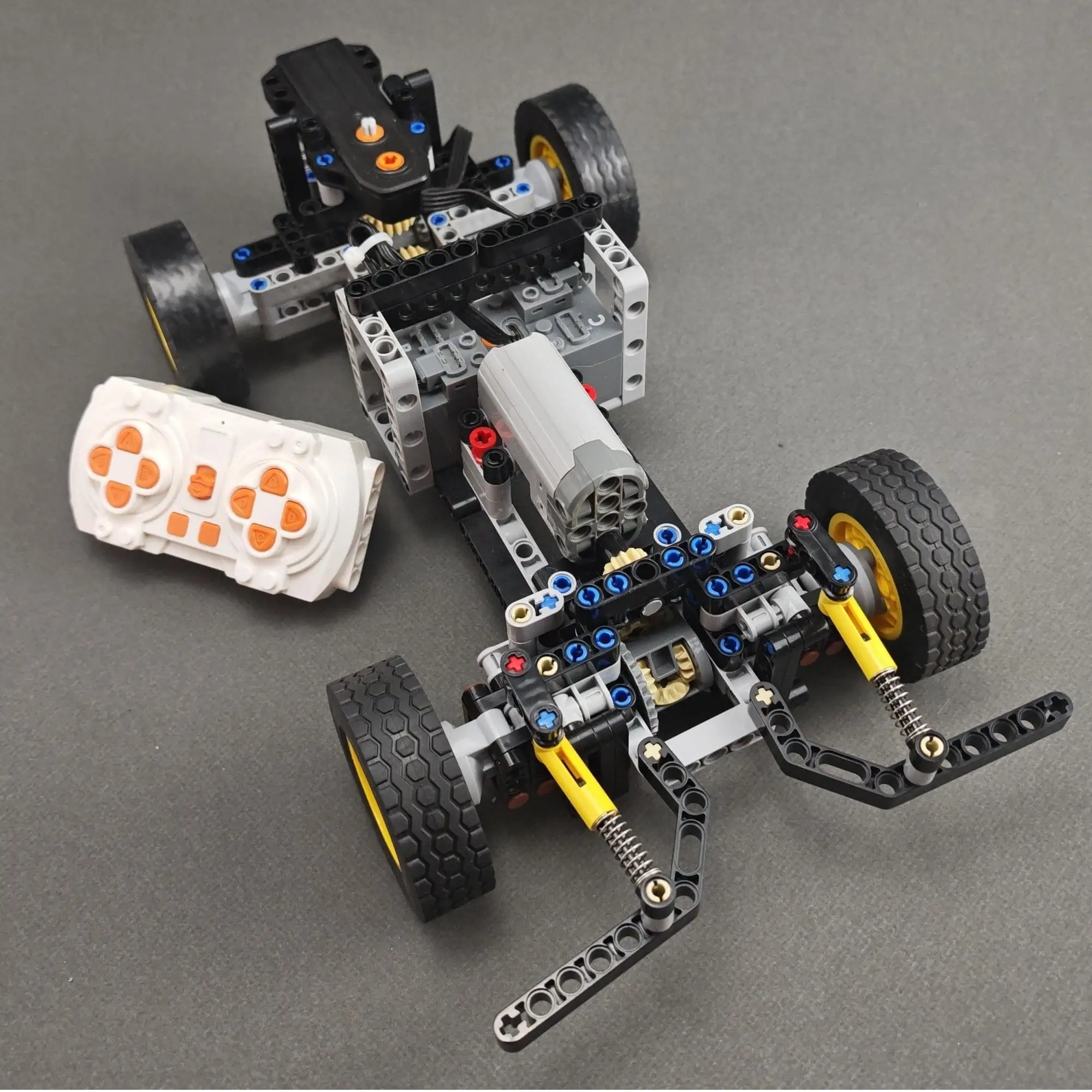 الالكترونيات الانجراف سباق السيارات اللبنات التقنية DIY عالية السرعة رودستر أربع عجلات التوجيه تعليق نموذج اللعب الهدايا #2