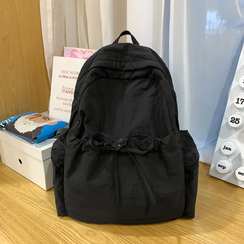 Korean Minimalist 2025 New Solid Color Large Capacity Lightweight Backpack Student School Bag Travel Dual Purpose Unisex Design
