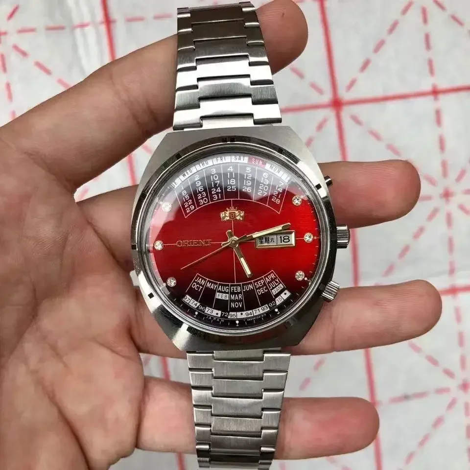 

9898 Store Orient automatic mechanical unisex watch with rotating large dial, fully functional stainless steel world time