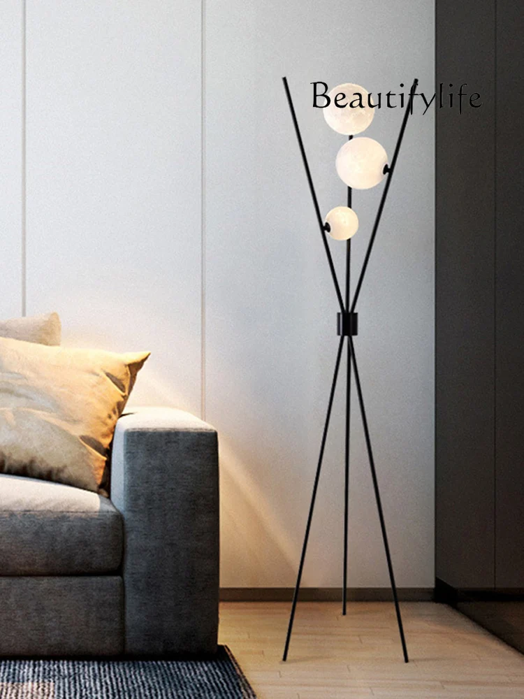 

Tripod floor lamp moon design sense Nordic light luxury minimalist living room sofa bedroom floor lamp