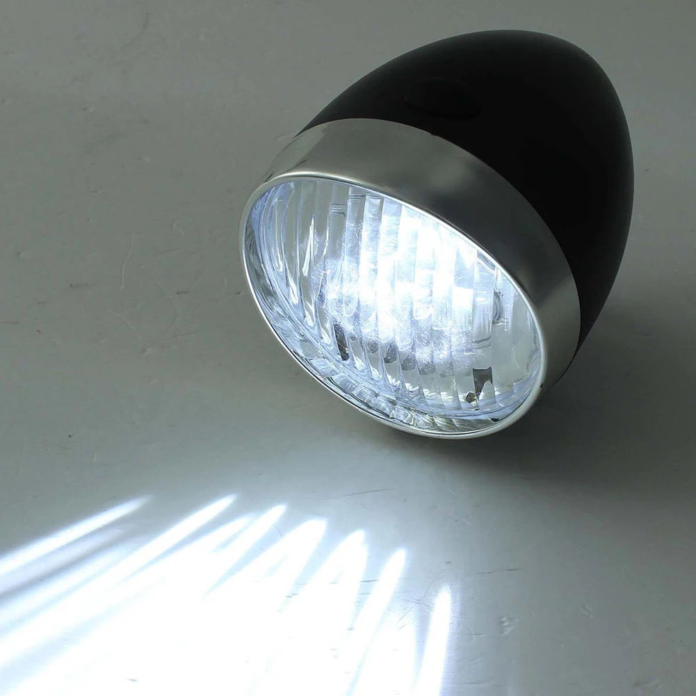 

LED Head Lamp for Bikes with Retro Aesthetic and 160 Degree Beam Angle Designed for Standard Fork or Brake Mounting