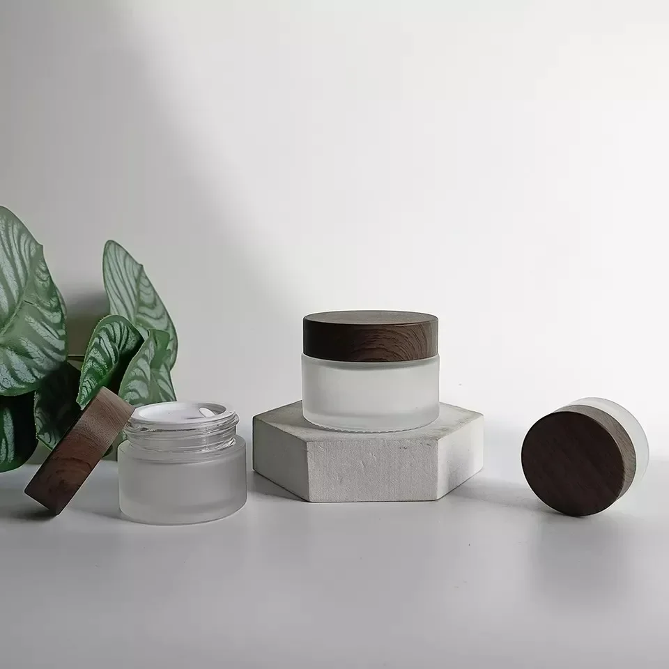 قناع كريم الوجه التجميلي، حاوية مستحضرات التجميل، برطمانات كريم بلوري، لوشن الجسم الزجاجي الشفاف غير اللامع مع أغطية خشبية داكنة بلاستيكية #6