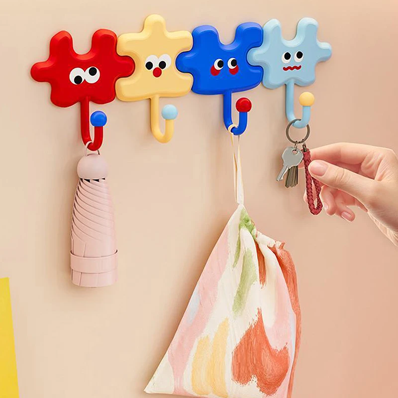4 Stück bunte, kreative Haken in Puzzle-Form, robuste Magnethaken, selbstklebende Haken, Mehrzweck-Aufbewahrungshaken