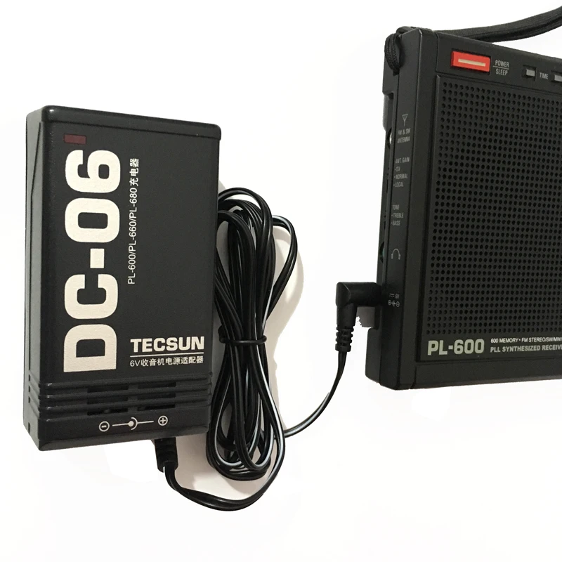 Original TECSUN DC-06 AC 220V/50Hz DC 6V 300mA Power Charger Adapter US Plug for PL600 PL660 PL-680 R-9700DX PL450 etc.