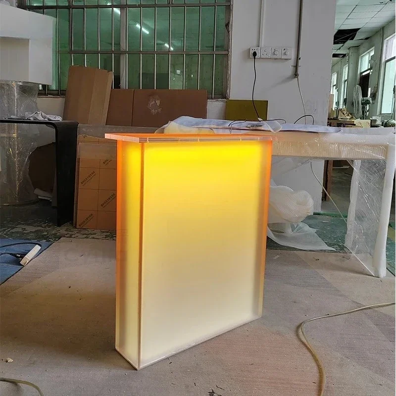 A  Transparent matte orange acrylic table legs custom suspended table feet dining table bracket island desk
