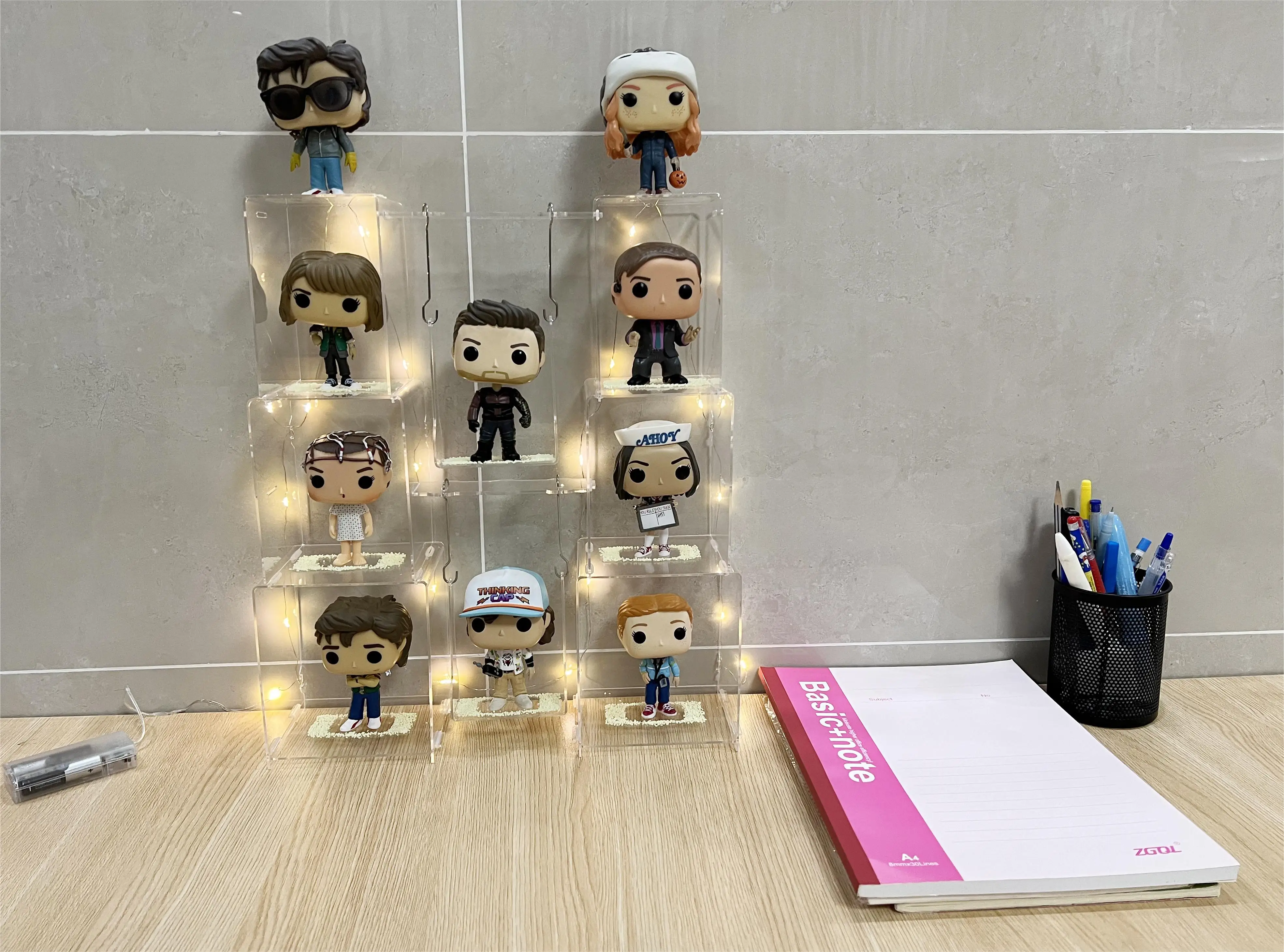 Transparent acrylic display stands are compatible with Funko POP figures for decoration and storage, glowing at night