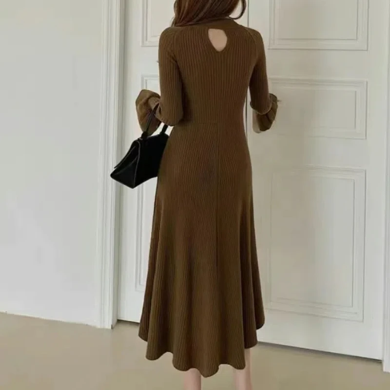 Fashion Elegant Spring Autumn New Women\'s Solid Color Spliced Hollow Out Slim Flare Sleeve Midi A-line Knitted Sweater Dresses