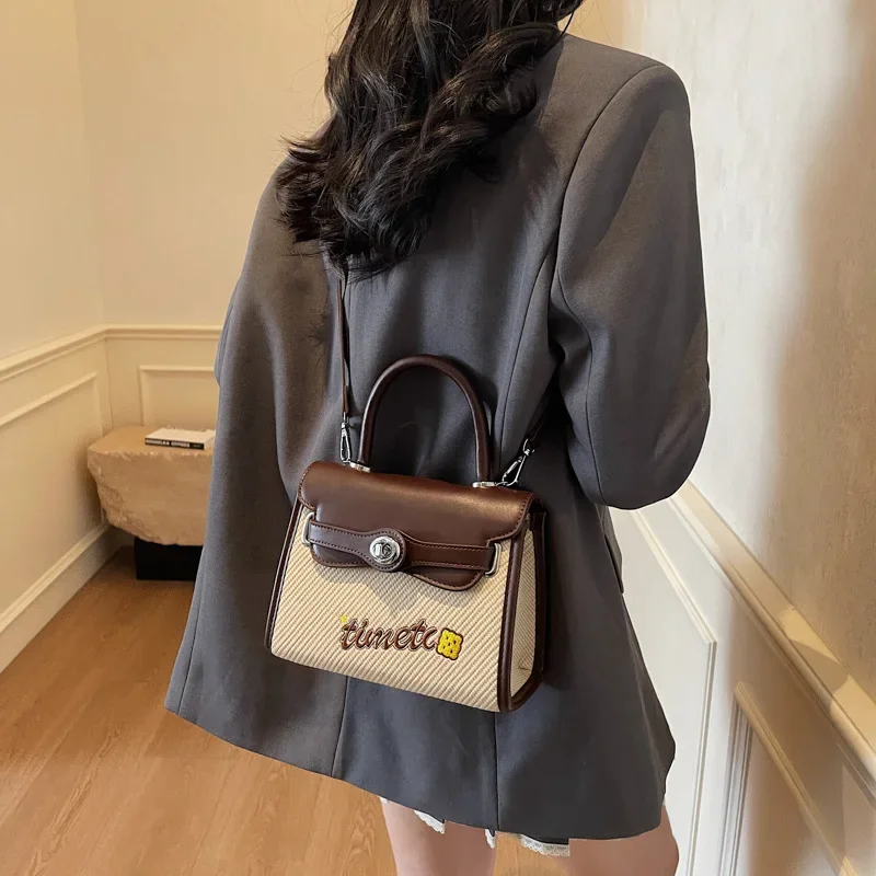 

2025 New Arrival! Women's Stylish Niche Handheld Kelly Bag - High - End Feeling, Versatile for Single Shoulder and Crossbody